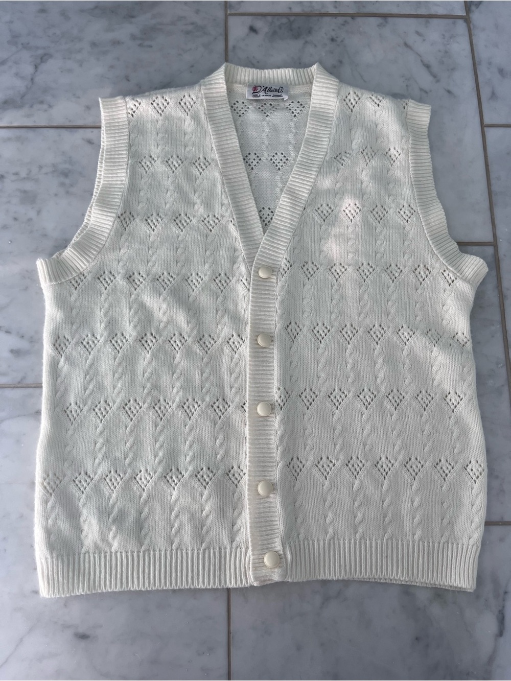 Classic Cream Knit Button-Front Sleeveless Cardigan. Small stain in pics